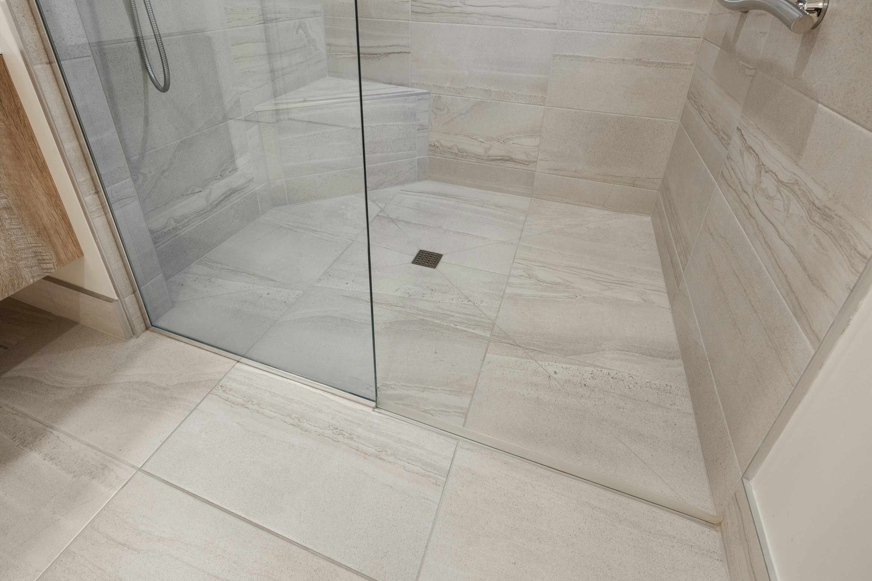 Bathroom shower tile installation with large format porcelain tiles in Helena MT